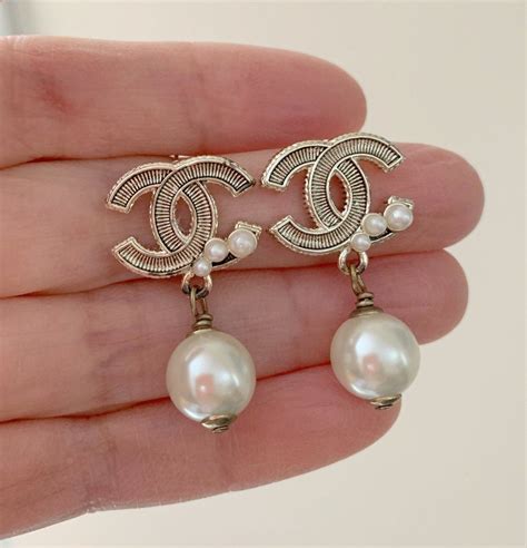 chanel dangling pearl earrings price|Chanel earrings authentic.